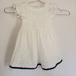 Baby girl white lace dress w/pom pom fringe